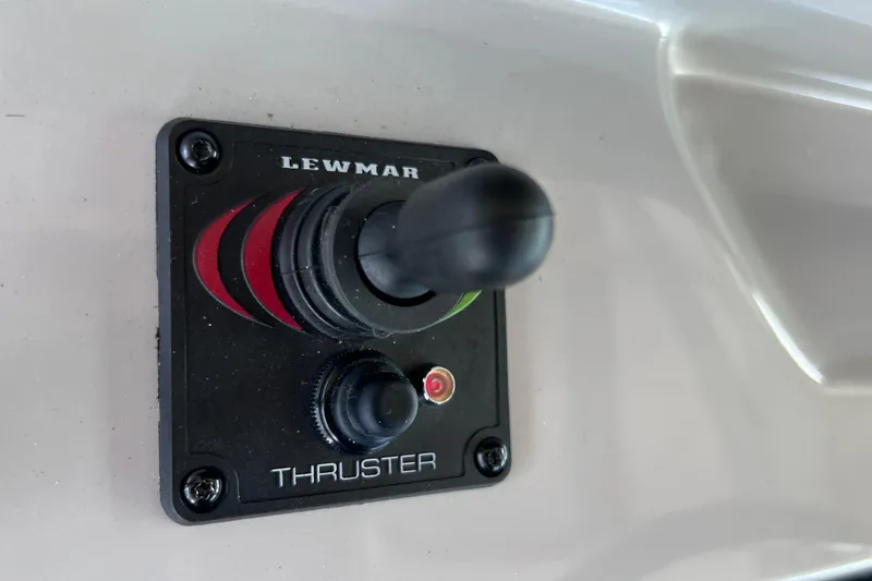 Slide: The Image of Lewmar thruster control on 2024 Regal 26 XO boat dashboard. - 45