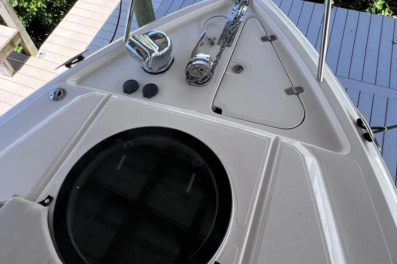 Slide: The Image of 2024 Regal 26 XO boat deck with anchor and hatch details. - 47