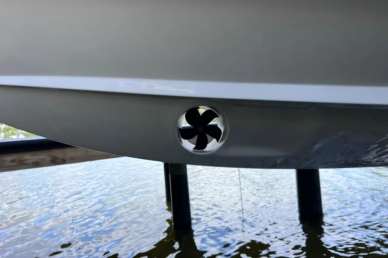 Slide: The Image of 2024 Regal 26 XO boat hull with visible thruster above water. - 5