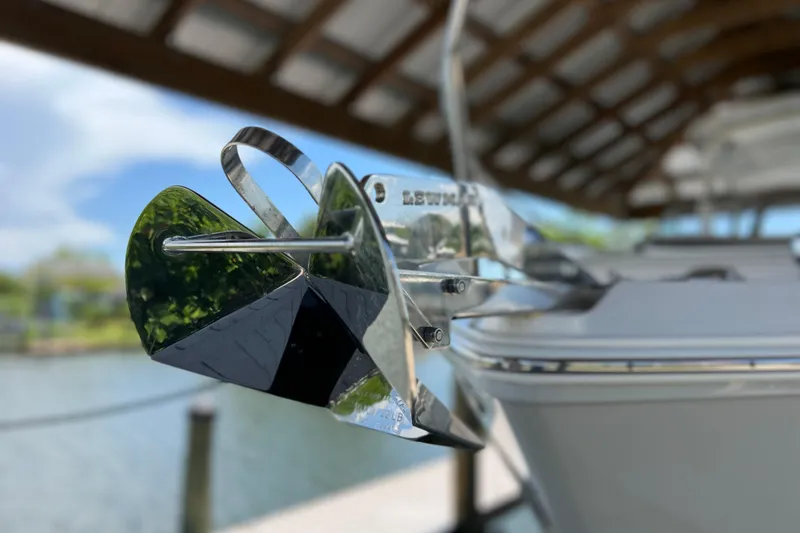 Slide: The Image of Close-up of a 2024 Regal 26 XO boat anchor in a marina setting. - 6