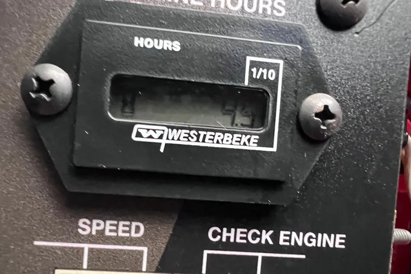 Slide: The Image of Hour meter display on a 2024 Regal 26 XO boat engine panel. - 67
