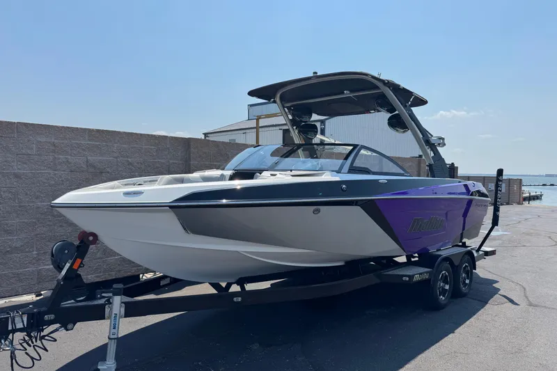 Slide: The Image of 2018 Malibu Wakesetter 23 LSV boat on trailer, parked outdoors, side view. - 3