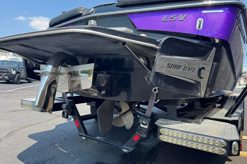 Slide: The Image of 2018 Malibu Wakesetter 23 LSV boat with Surf Gate technology, rear view. - 6