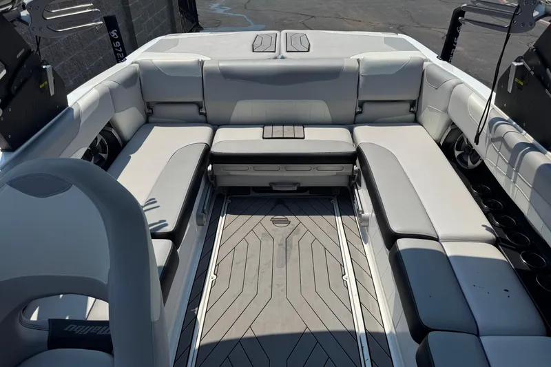 Slide: The Image of 2018 Malibu Wakesetter 23 LSV interior with spacious seating and modern design. - 7