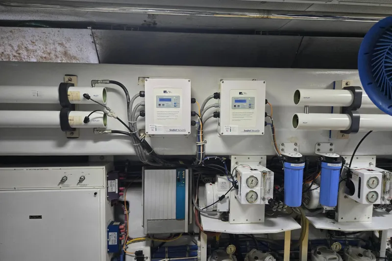 Slide: The Image of Engine room of 2002 Hatteras 92 Cockpit Motor Yacht with water filtration system. - 46