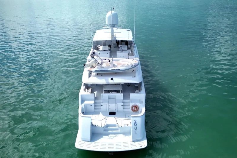 Slide: The Image of Aerial view of 2002 Hatteras 92 Cockpit Motor Yacht on calm water. - 7