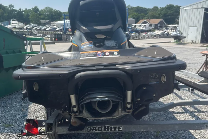 Slide: The Image of 2022 Kawasaki Jetski STX 160LX on trailer at marina, rear view. - 7