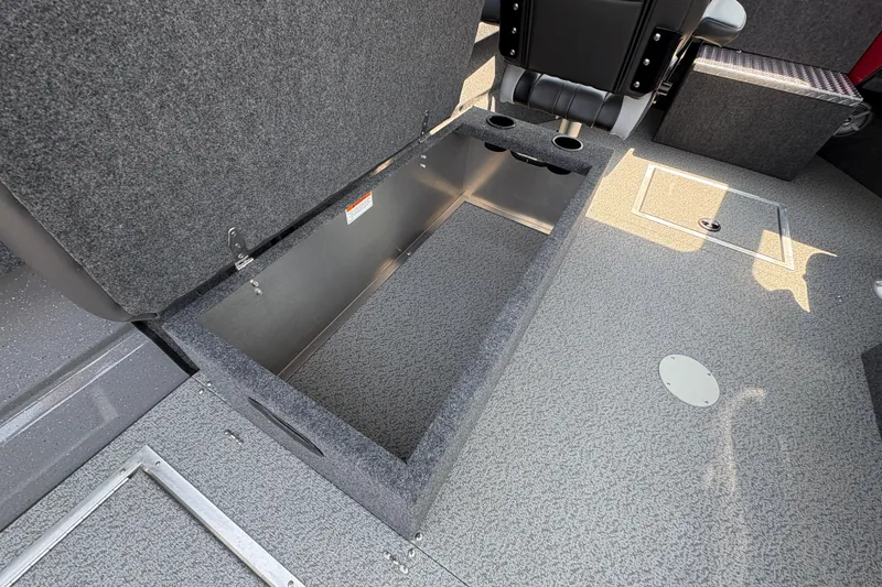 Slide: The Image of Open storage compartment in 2026 Lund 185 HG boat interior. - 35