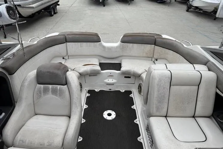 Slide: The Image of 2007 Yamaha AR 230 boat interior with spacious seating and cushioned upholstery. - 12
