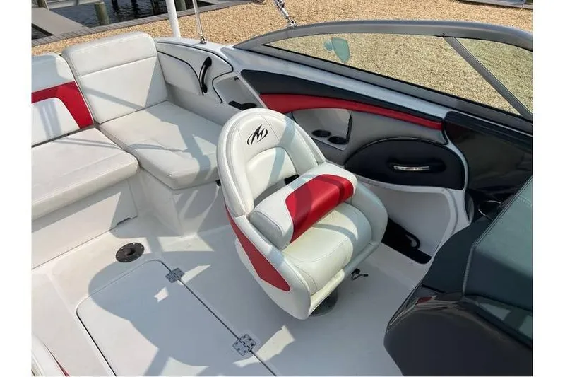 Slide: The Image of 2015 Monterey 217 Blackfin boat interior with white and red seating. - 14