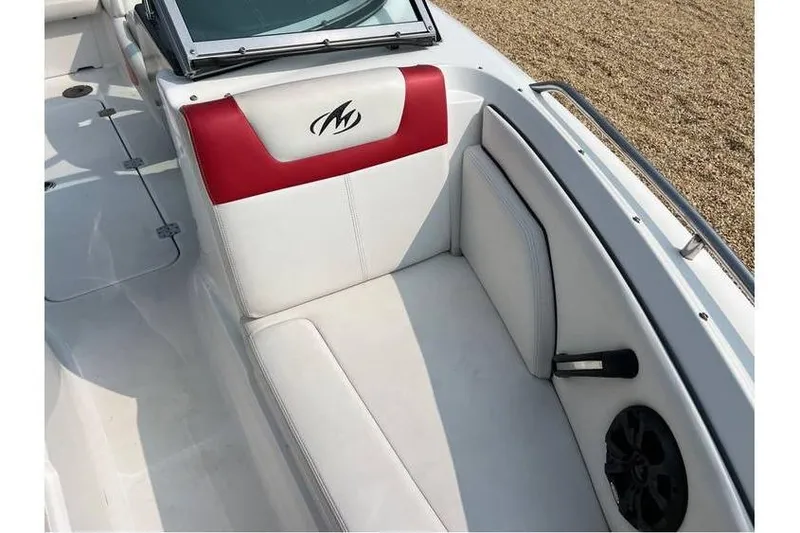 Slide: The Image of 2015 Monterey 217 Blackfin boat interior with red and white seating. - 15