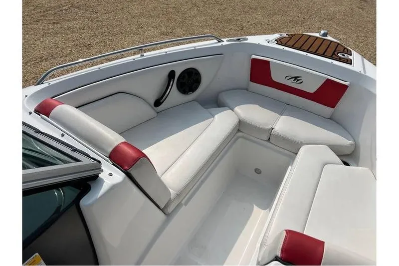 Slide: The Image of 2015 Monterey 217 Blackfin boat interior with white and red seating. - 18