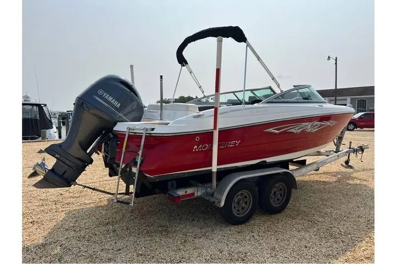 Slide: The Image of 2015 Monterey 217 Blackfin boat on trailer with Yamaha outboard motor. - 3