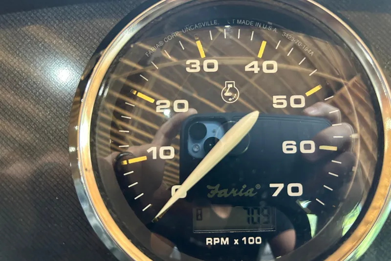 Slide: The Image of Close-up of a Faria tachometer on a 2023 Godfrey SWEETWATER 2286 SB boat. - 8
