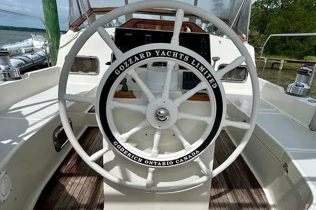 Slide: The Image of Steering wheel of 2016 Gozzard 41 RC yacht, featuring "Gozzard Yachts Limited" branding. - 17