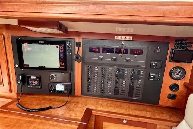 Slide: The Image of Control panel of 2016 Gozzard 41 RC yacht with navigation and communication equipment. - 25