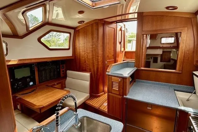 Slide: The Image of Luxurious interior of 2016 Gozzard 41 RC yacht with wood finish and modern amenities. - 28