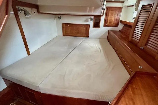 Slide: The Image of Cozy cabin interior of 2016 Gozzard 41 RC sailboat with wooden furnishings. - 36