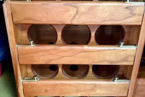 Slide: The Image of Wooden wine rack on a 2016 Gozzard 41 RC sailboat. - 38
