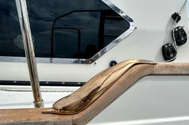 Slide: The Image of Gozzard 41 RC 2016 yacht detail with polished wood and metal accents. - 6