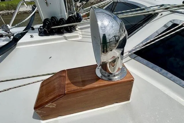 Slide: The Image of Chrome vent on 2016 Gozzard 41 RC yacht deck with wooden base. - 9