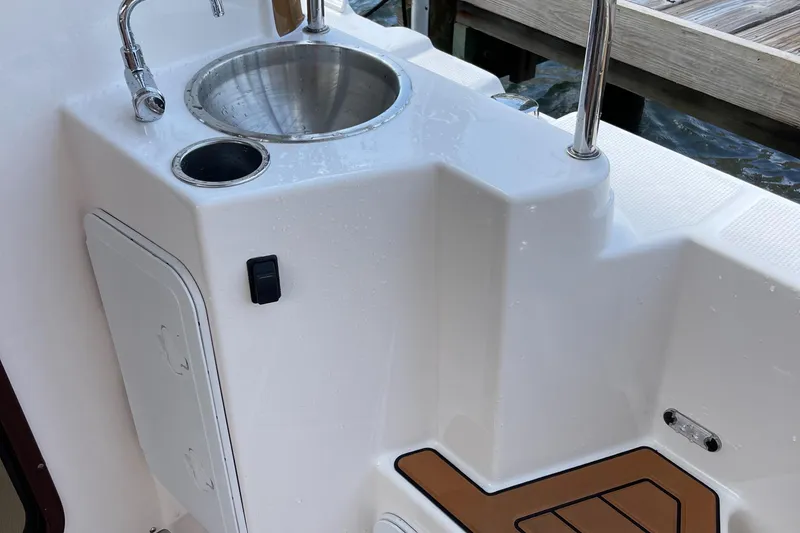 Slide: The Image of 2025 Ranger Tugs R-31S boat sink and deck area. - 18