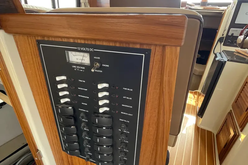 Slide: The Image of Electrical control panel on 2025 Ranger Tugs R-31S boat. - 34