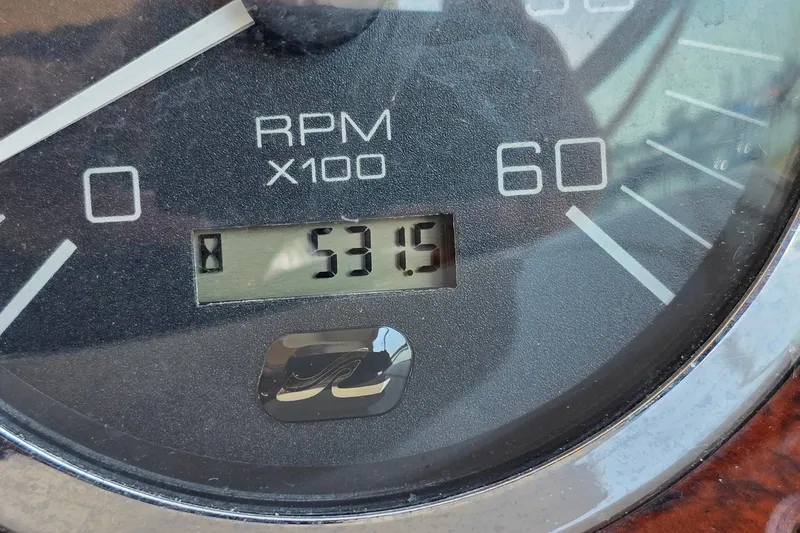 Slide: The Image of Close-up of 2003 Sea Ray 280 Sundancer RPM gauge showing 5315 RPM. - 37