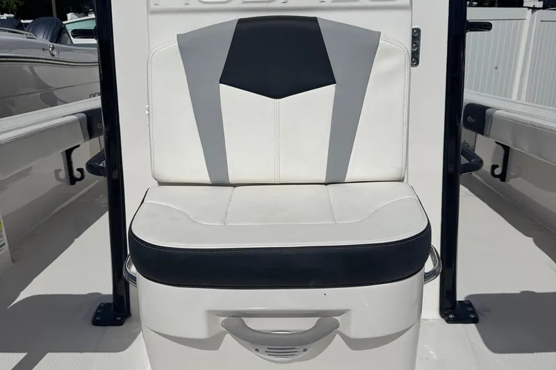 Slide: The Image of 2025 Robalo 246 Cayman SD boat seat with modern design and comfortable cushioning. - 16