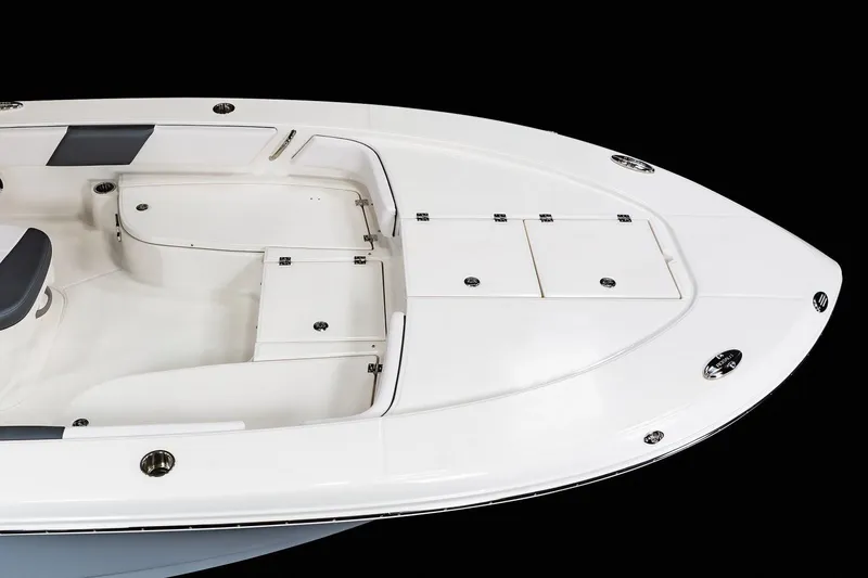 Slide: The Image of Manufacturer Provided Image: 2025 Robalo 246 Cayman SD boat deck, featuring sleek design and ample storage compartments. - 28
