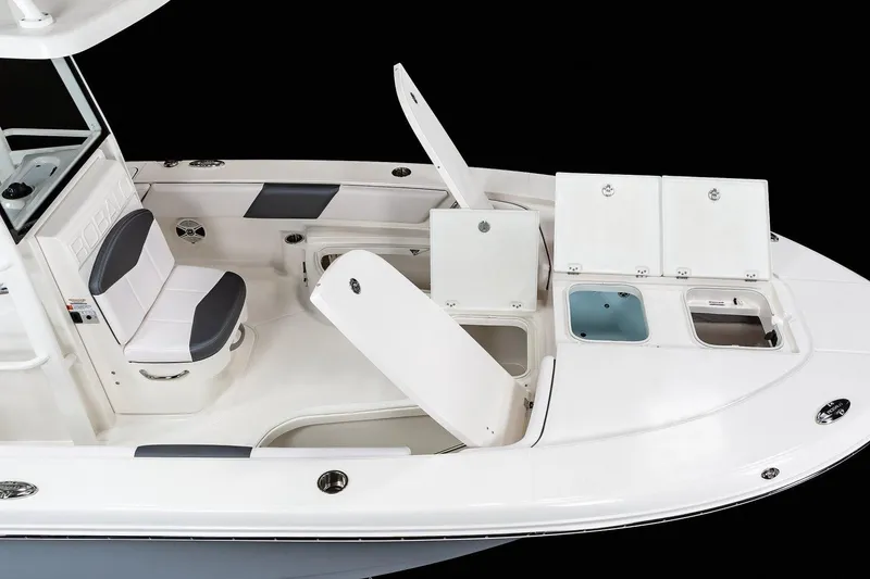 Slide: The Image of Manufacturer Provided Image: 2025 Robalo 246 Cayman SD boat interior with storage compartments and seating. - 29