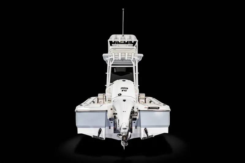 Slide: The Image of Manufacturer Provided Image: 2025 Robalo 246 Cayman SD boat, rear view, sleek design, black background. - 42