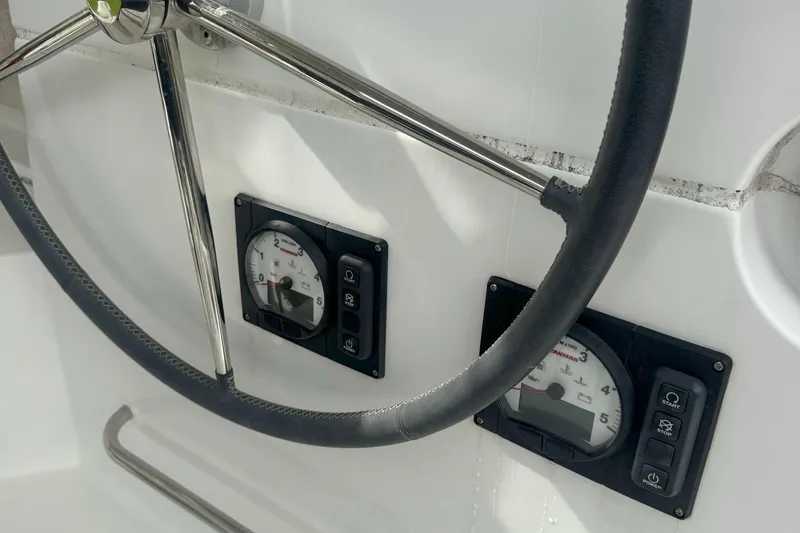 Slide: The Image of Steering wheel and gauges of 2022 Lagoon 40 yacht cockpit. - 16