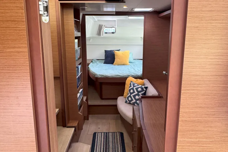 Slide: The Image of Interior of 2022 Lagoon 40 yacht with cozy bedroom and stylish wooden finish. - 36