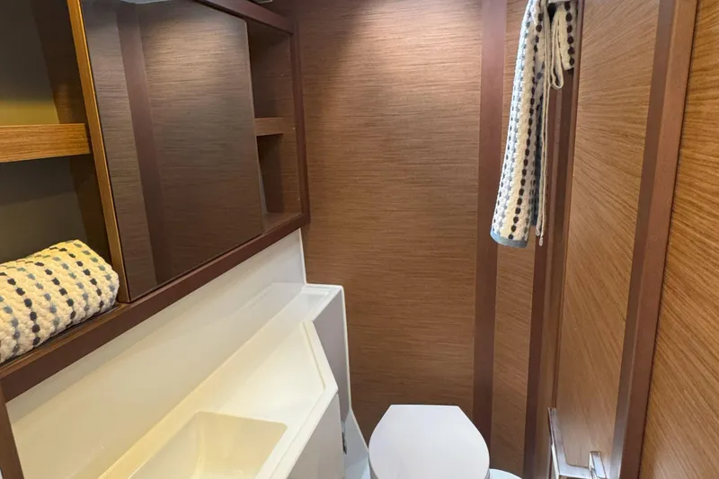 Slide: The Image of Modern bathroom interior of 2022 Lagoon 40 yacht with wooden accents and sleek fixtures. - 48