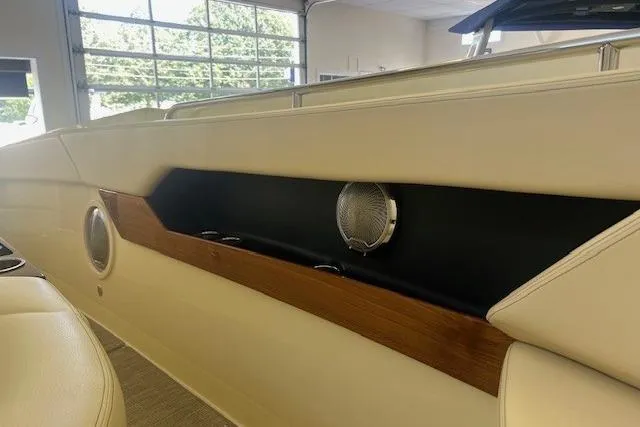 Slide: The Image of 2026 Chris-Craft Catalina 31 interior detail with speaker and wood trim. - 10