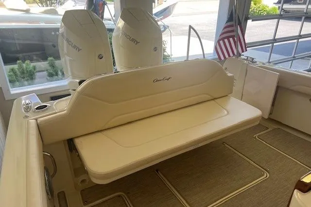 Slide: The Image of 2026 Chris-Craft Catalina 31 boat interior with seating and Mercury engines. - 9