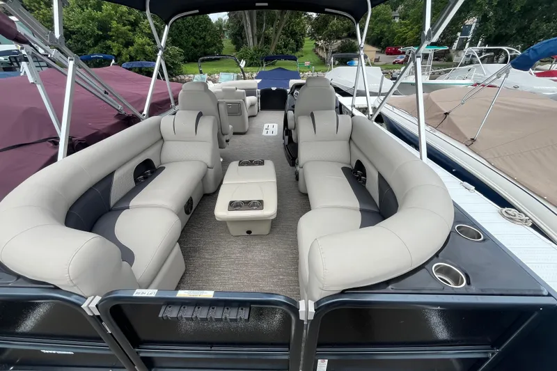 Slide: The Image of 2020 Premier 230 SunSation RF pontoon boat with spacious seating and modern design. - 30
