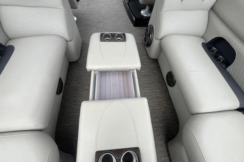 Slide: The Image of Interior of 2020 Premier 230 SunSation RF boat with plush seating and cup holders. - 36