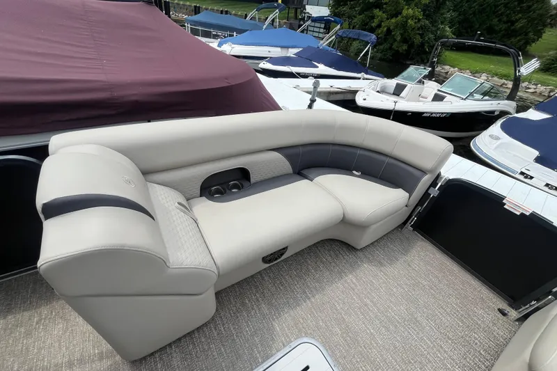 Slide: The Image of Luxurious seating on 2020 Premier 230 SunSation RF pontoon boat at dock. - 52