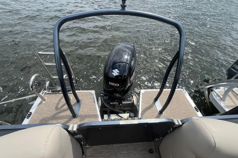 Slide: The Image of 2020 Premier 230 SunSation RF pontoon boat with Suzuki 150 outboard motor on water. - 62