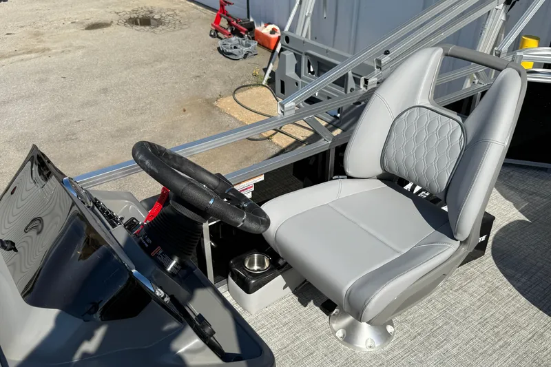 Slide: The Image of 2026 Tahoe Pontoon Sport 85 Cruise on trailer, featuring spacious seating and sleek design. - 2