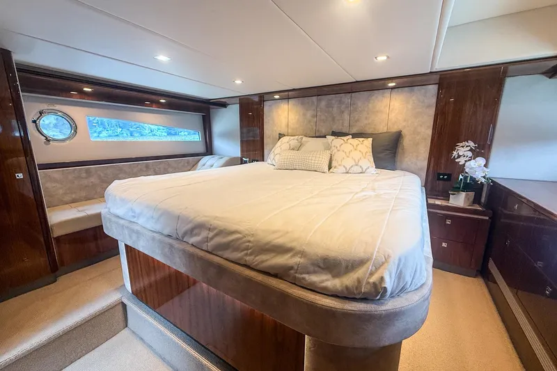 Slide: The Image of Luxurious bedroom interior of 2021 Riviera 5400 Sport Yacht Platinum Edition. - 59