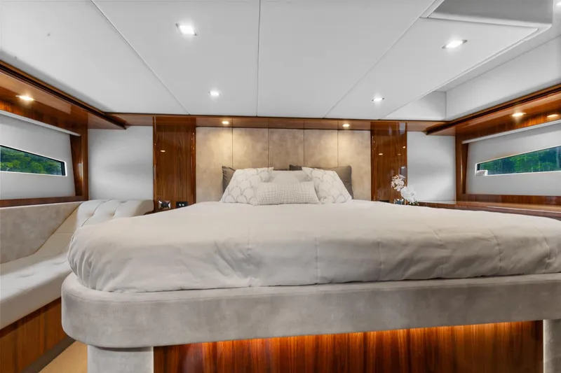 Slide: The Image of Luxurious bedroom interior of 2021 Riviera 5400 Sport Yacht Platinum Edition. - 60