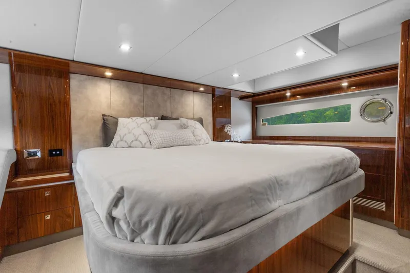 Slide: The Image of Luxurious bedroom interior of 2021 Riviera 5400 Sport Yacht Platinum Edition. - 62
