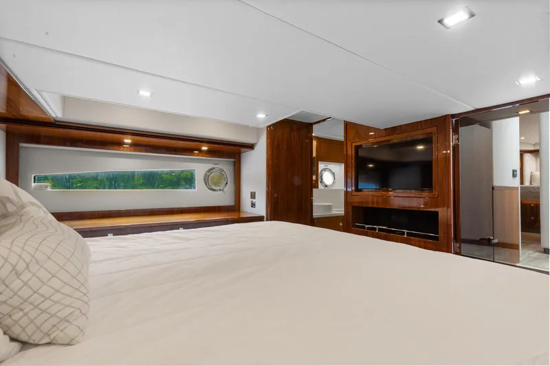 Slide: The Image of Luxurious interior of 2021 Riviera 5400 Sport Yacht Platinum Edition with modern amenities. - 64