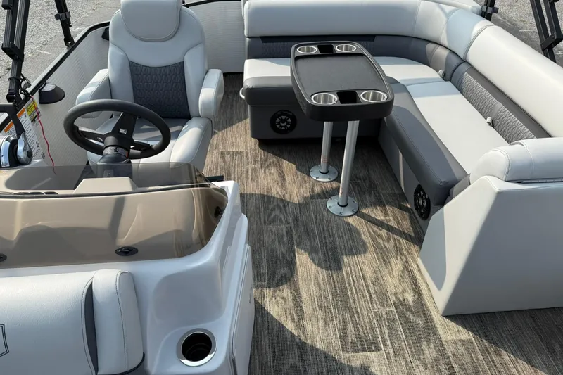 Slide: The Image of Interior of 2021 Godfrey Sweetwater 2086 C pontoon boat with seating and steering console. - 12