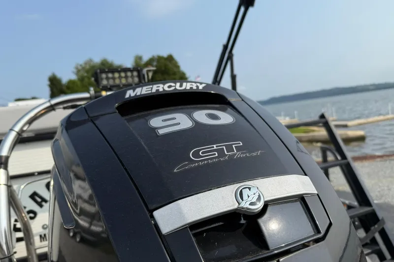 Slide: The Image of Mercury 90 CT Command Thrust engine on 2021 Godfrey Sweetwater 2086 C boat by the lake. - 3