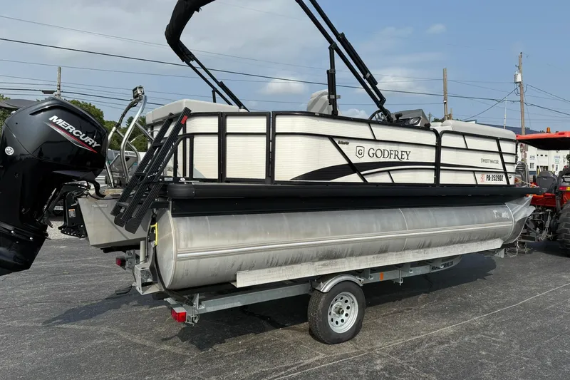 Slide: The Image of 2021 Godfrey Sweetwater 2086 C pontoon boat on trailer with Mercury outboard motor. - 4