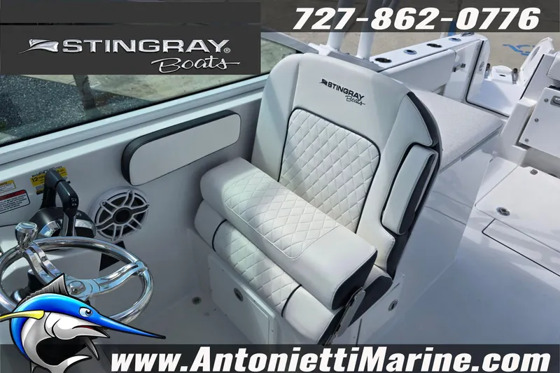 Slide: The Image of 2026 Stingray 259DC boat interior with luxury seating and steering wheel, Antonietti Marine branding. - 25